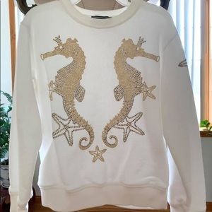 Young Versace sweater